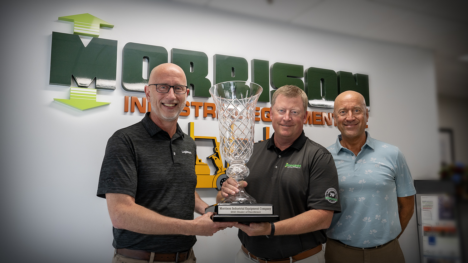 MLA Exec. VP of Sales & Aftermarket Services presents the 2023 MLA Dealer of Excellence Award to Morrison Industrial Equipment