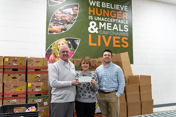 Morrison presents Feeding America donation